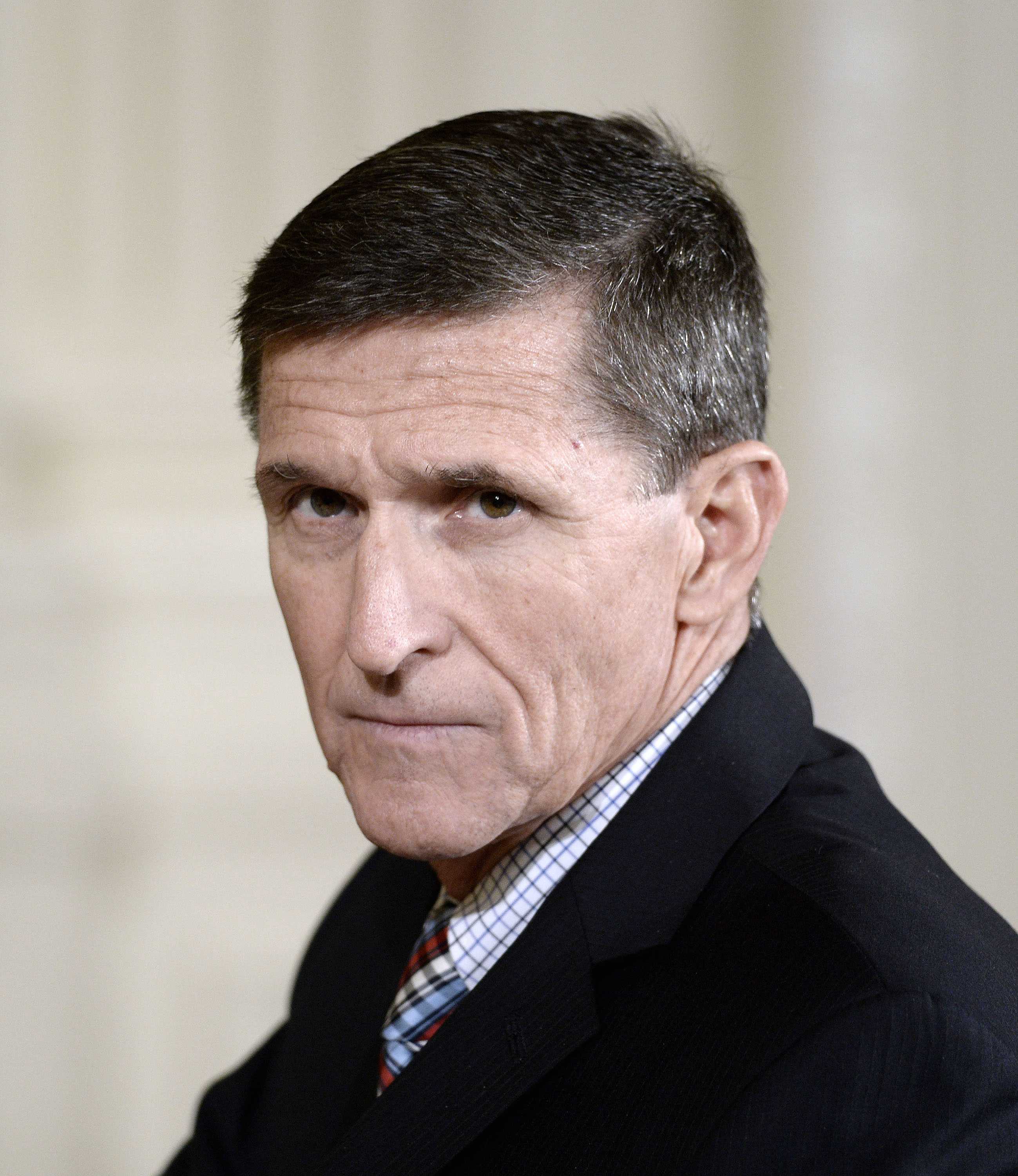 Michael Flynn attends a news conference on February 10, 2017, at the White House in Washington, D.C. Four Democratic senators have charged in a series of letters that the appointment of Flynn as Donald Trump's national security adviser