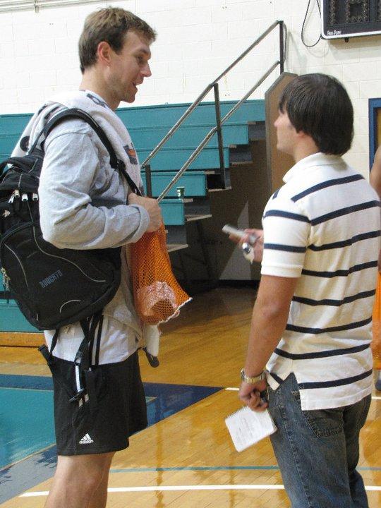 Chad Graves interviews Charlotte Bobcats guard Matt Carroll during training camp at UNCW two years ago.