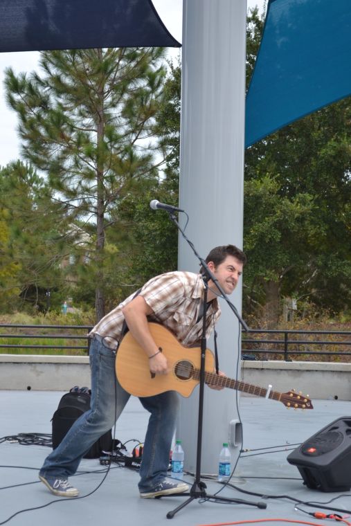 Jason LeVasseur gets into his rendition of The Itsy Bitsy Spider. LeVasseur played many of his own songs, but ended them with popular, well-known songs today. He also encouraged crowd participation and sing-alongs from the students.