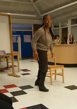 Glenis Redmond stands in front of the adult workshop as she performs one of her original poems entitled, Bruised. She showed enthusiam and passion for her words, providing those who attended a sampling of how effective her techniques can be towards an individuals writing.