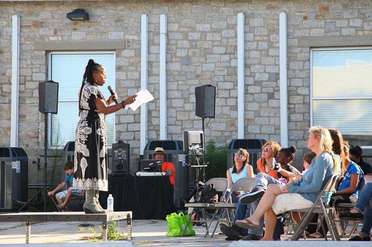 Award-winning poet, performer and teaching arist Glenis Redmond speaks to a crowd at Dreams of Wilmington. UNCWs Office of Cultural Arts, with New Hanover County Schools presented Poetry off the Page Oct. 17-20.