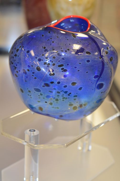 Shinn’s influence on campus will endure through the various art installations he sanctioned, a couple of which can be seen in Randall Library. Artwork from famous glass blower Dale Chihuly, a recipient of a National Living Treasure award, is exhibited in Randall thanks to Shinn’s determination.
