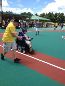 Morrison slides into home at a Wilmington Miracle League game. As vice chair of the Miracle League, Morrison has gotten to enjoy the field that he helped create. 
