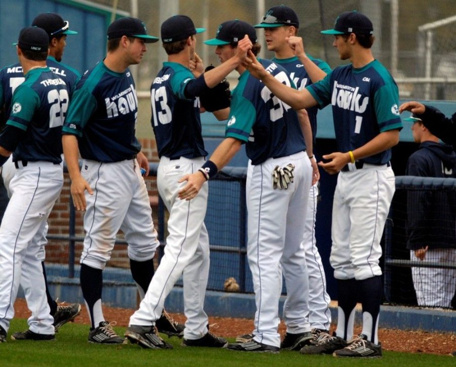 The Seahawks celebrate during Sundays 15-1 victory over Northeastern.