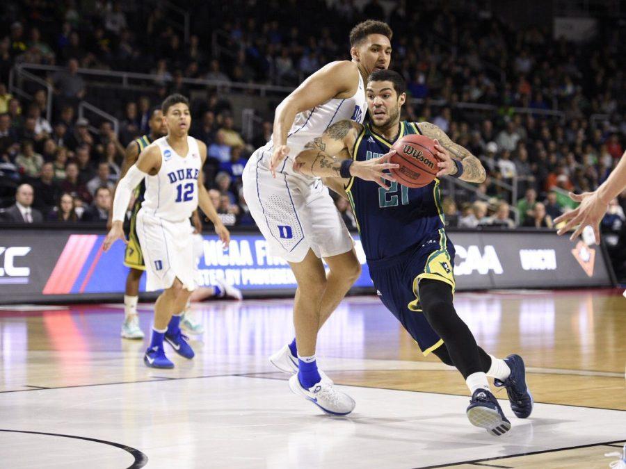 Sophomore forward, Marcus Bryan, makes a strong drive to the lane against the Duke Blue Devils in the first round of the NCAA tournament on March 17.