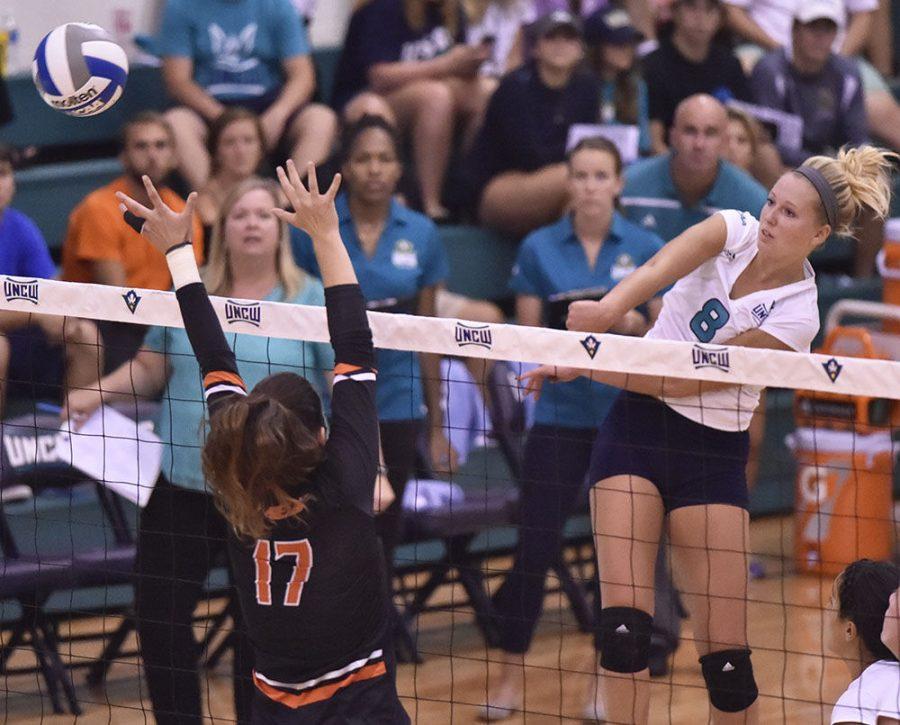 Kristin Powell (8) attempts a kill in Tuesdays 3-0 sweep of Campbell. 