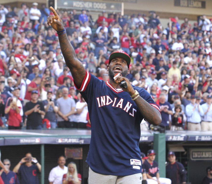 The Cleveland Cavaliers LeBron James gets the home crowd pumped before the Cleveland Indians meet the Boston Red Sox in Game 2 of the American League Division Series on Friday, Oct. 7, 2016, at Progressive Field in Cleveland. The Tribe won, 6-0, and now lead the series, 2-0. (Phil Masturzo/Akron Beacon Journal/TNS)