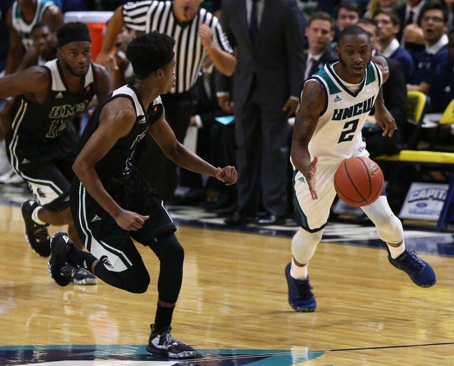 JaQuel Richmond (2) sprints into one of many fast breaks UNCW would run in its 117-65 win over Mount Olive on Sunday.