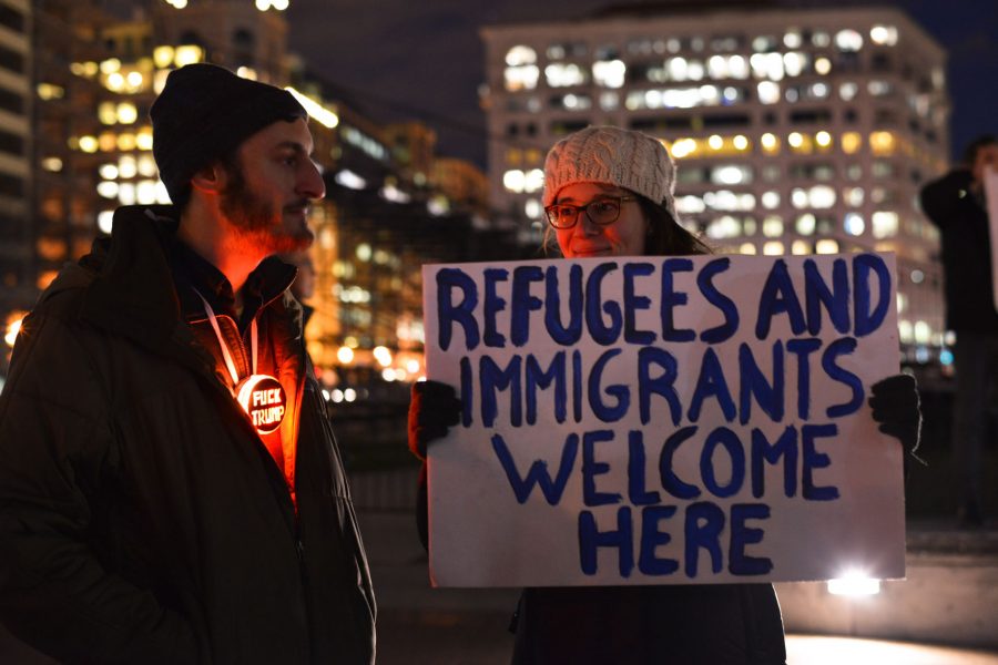 Activists in downtown Washington, D.C. protest President Donald Trumps proposed executive order Thursday, Jan. 26, 2017, which would halt refugee admissions for 4 months, and suspend or ban entry to the U.S. from many Muslim majority countries. Activists call the order a backdoor Muslim ban. (Miguel Juarez Lugo/Zuma Press/TNS)
