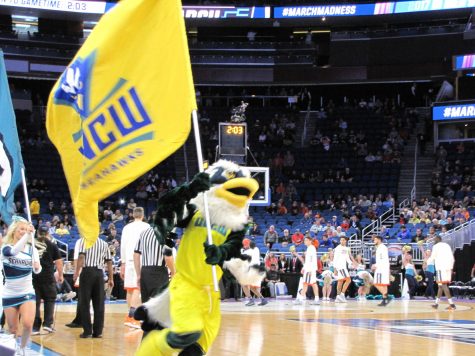 Sammy C. Hawk leads the charge as UNCW takes the floor vs. Virginia.