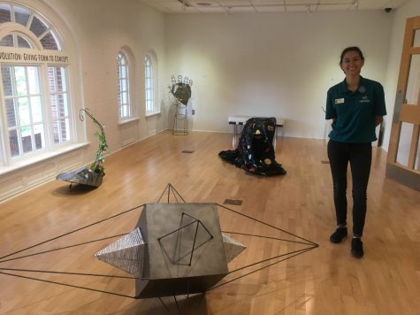 Catarina Mendez, Arts Chair for the Association for Campus Entertainment, in UNCW's Boseman Art Gallery.