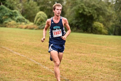 Alex Boseman runs the trails in one of UNCW's many meets during the 2016 cross-country season. (Photo by UNCW Athletic Communications)