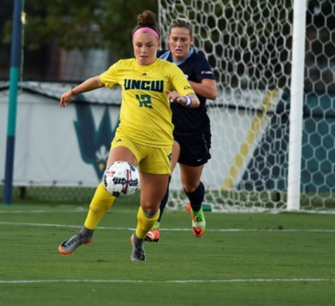 Serenity Waters (12) takes possession of the ball during UNCW's game vs. Old Dominion on Sept. 8, 2017.