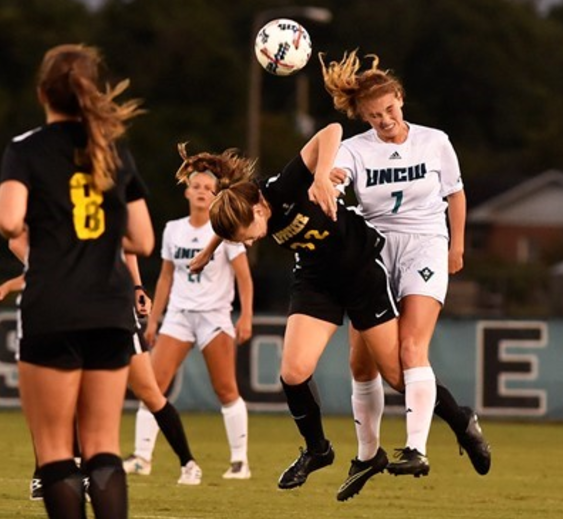 UNCWs Molly McGarry (7, right puts her head to use in the Seahawks game vs. Appalachian State on Saturday, Sept. 9, 2017.