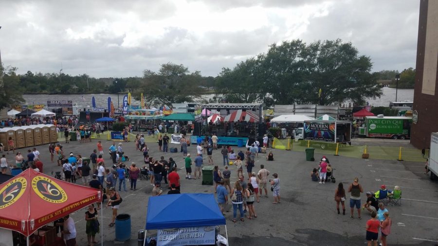 The view of Wilmington Riverfest from the balcony of Front Street Brewery on Saturday, Oct. 7. Thousands of Wilmington residents gathered for the annual festival, which highlights local artists and businesses in a community setting. 