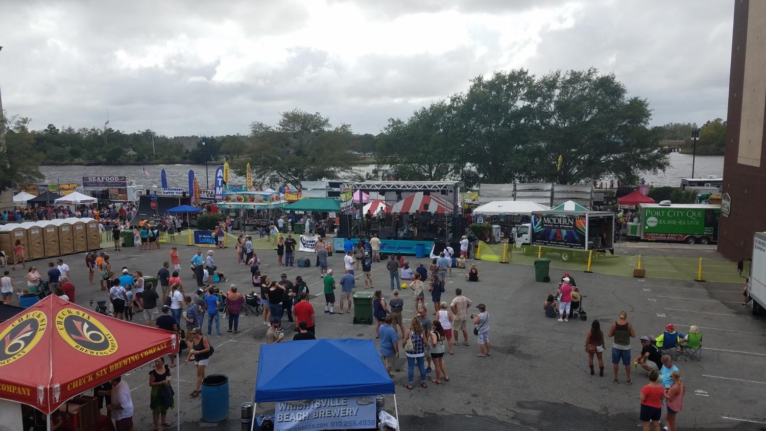 The view of Wilmington Riverfest from the balcony of Front Street Brewery on Saturday, Oct. 7. Thousands of Wilmington residents gathered for the annual festival, which highlights local artists and businesses in a community setting.