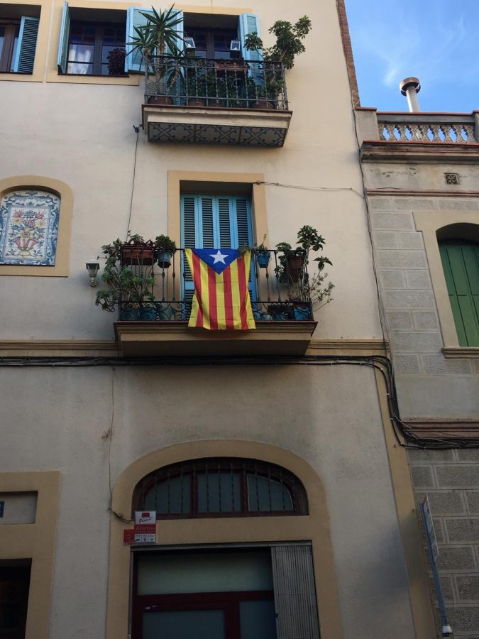 The Catalan Independence Flag hangs over a homes balcony in Barcelona, the capital of Catalonia. 