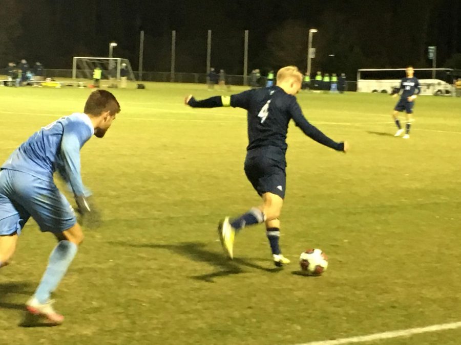 UNCW midfielder Joel Bylander plays a ball against UNC in the second round of the NCAA tournament on November 19, 2017.