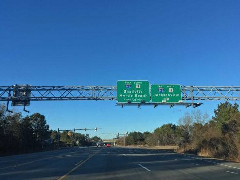 Signage approaching an interchange with the newly completed Interstate 140 in Wrightsboro.