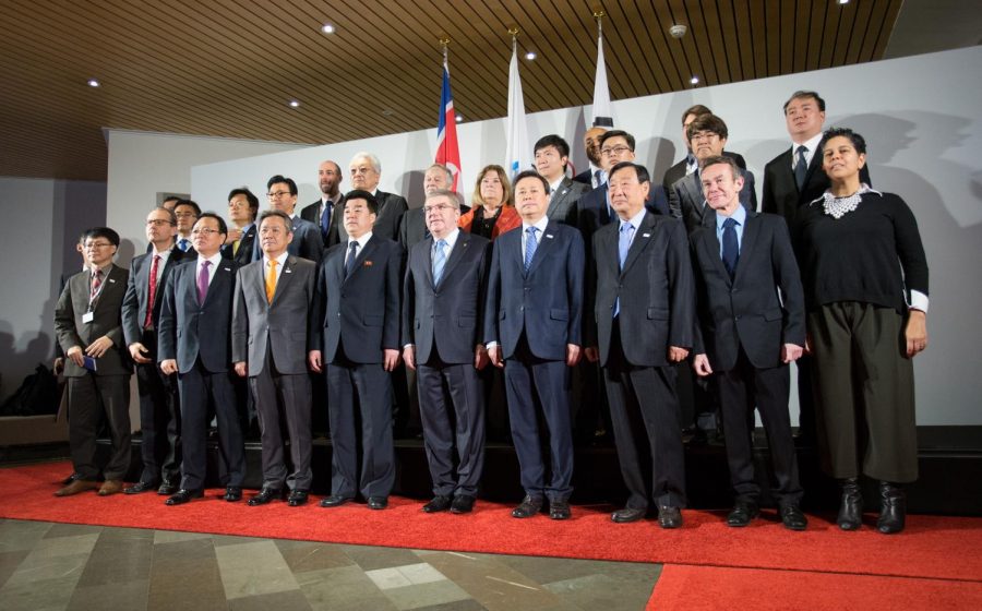 The Olympic delegations of North Korea and South Korea with International Olympic Committee President Thomas Bach, Jan. 20, 2018