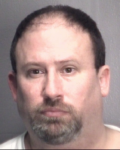 Michael Kelly, a former teacher at Isaac Bear Early College High School, was arrested late Tuesday, Jan. 6, for the sexual exploitation of a minor.