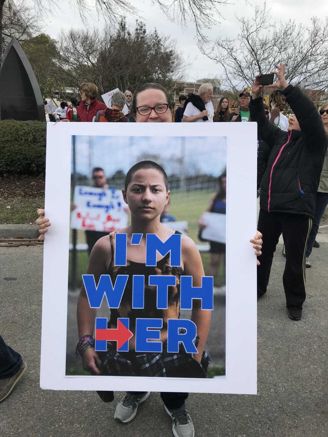 Wilmington resident Meg Gilbert at the March for Our Lives Rally in Downtown Wilmington. Gilbert's sign shows Parkland shooting survivor Emma Gonzalez who has become a popular face of the gun reform movement. Gilbert came to the rally because she
