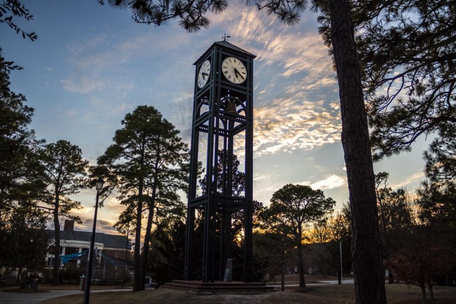 UNCWs clock tower in front of Randall Library. 