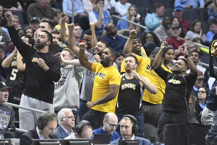 UMBC fans cheer their team during a break in the game against Kansas State during the second round of the NCAA tournament on Sunday, March 18, 2018 at the Spectrum Center in Charlotte, N.C.