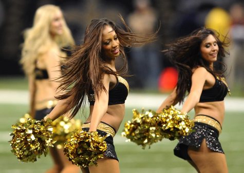 New Orleans Saints' cheerleaders cheer at a football game between the New Orleans Saints and the Carolina Panthers in Louisiana. (Jeff Siner/Charlotte Observer/MCT)