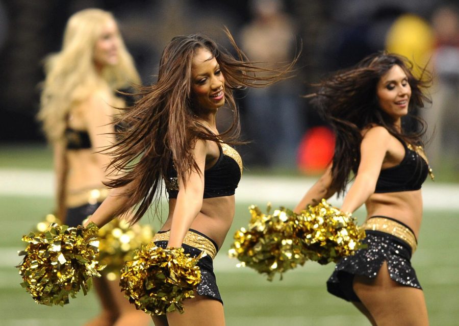 New Orleans Saints cheerleaders cheer at a football game between the New Orleans Saints and the Carolina Panthers in Louisiana. (Jeff Siner/Charlotte Observer/MCT)