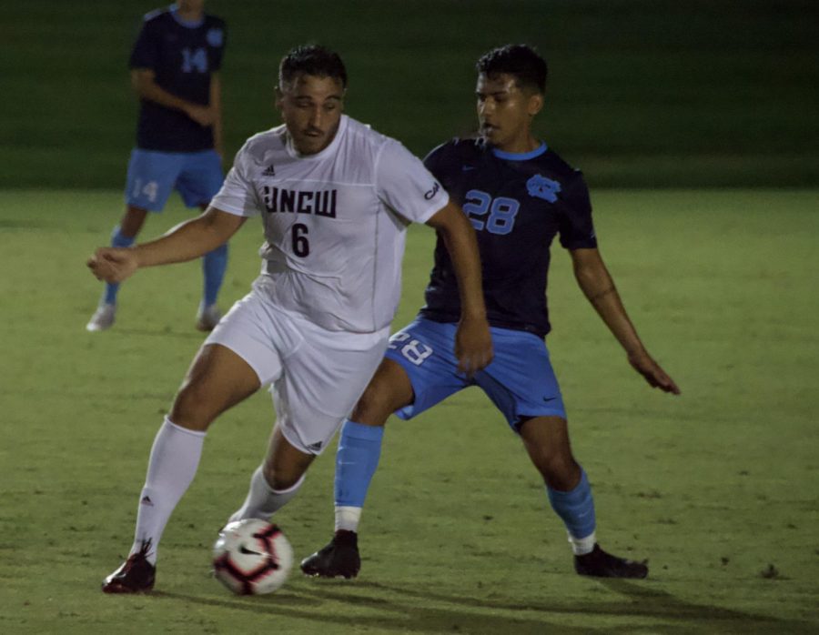 No. 6 David Lozano squares off with North Carolina's Raul Aguilera (28)