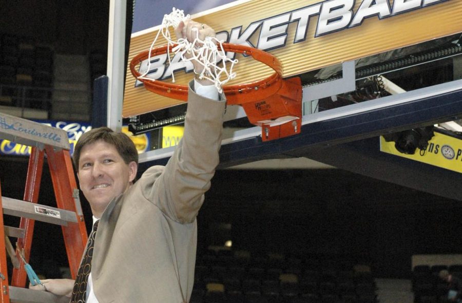 Former UNCW coach Brad Brownell cuts down the nets after winning the 2006 CAA tournament. It was the second conference title in Brownell’s four-year tenure in the Port City.