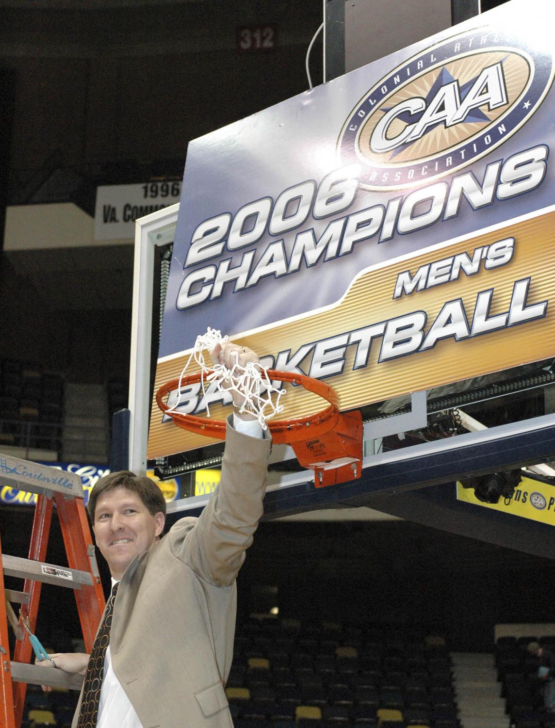 Former UNCW coach Brad Brownell cuts down the nets after winning the 2006 CAA tournament. It was the second conference title in Brownell’s four-year tenure in the Port City.