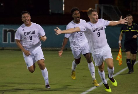 No. 9 Emil Elveroth celebrates after scoring his second goal in 77 seconds along with no. 3 Jamil Gracia and no. 6 David Lozano
