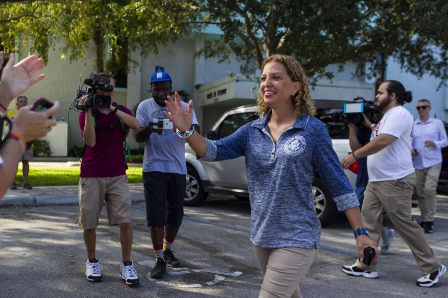 Congresswoman Debbie Wasserman Schultz greets volunteers outside the Hollywood Branch Library before early voting on Friday, Oct. 26, 2018. Wasserman Schultz, whose staff received a suspected mail bomb, said she was hopeful law enforcement would "catch this bastard."