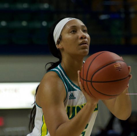 Gigi Smith (5) attempts a free throw during UNCW's Nov. 17, 2018 contest against Grand Canyon
