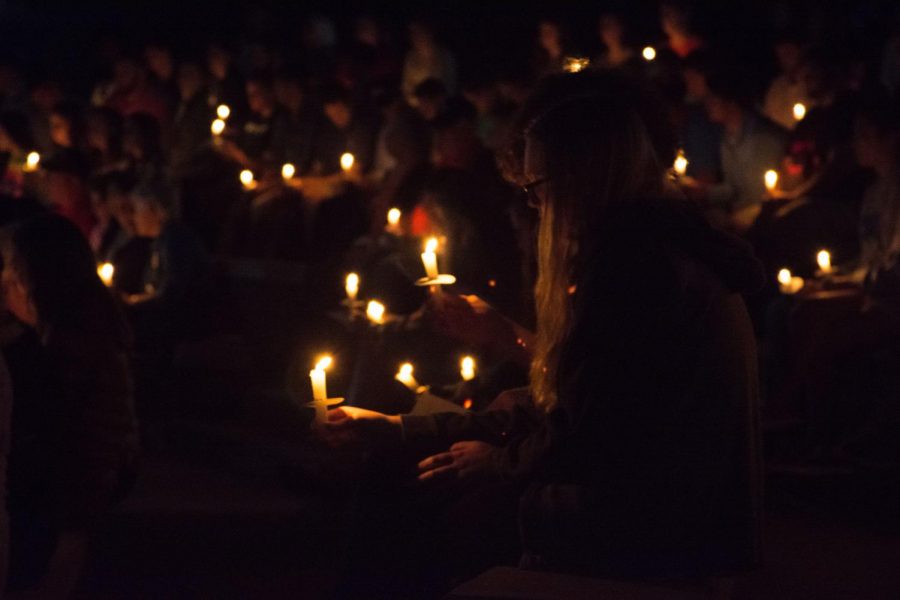 Each individual in the crowd was given a candle for the service.