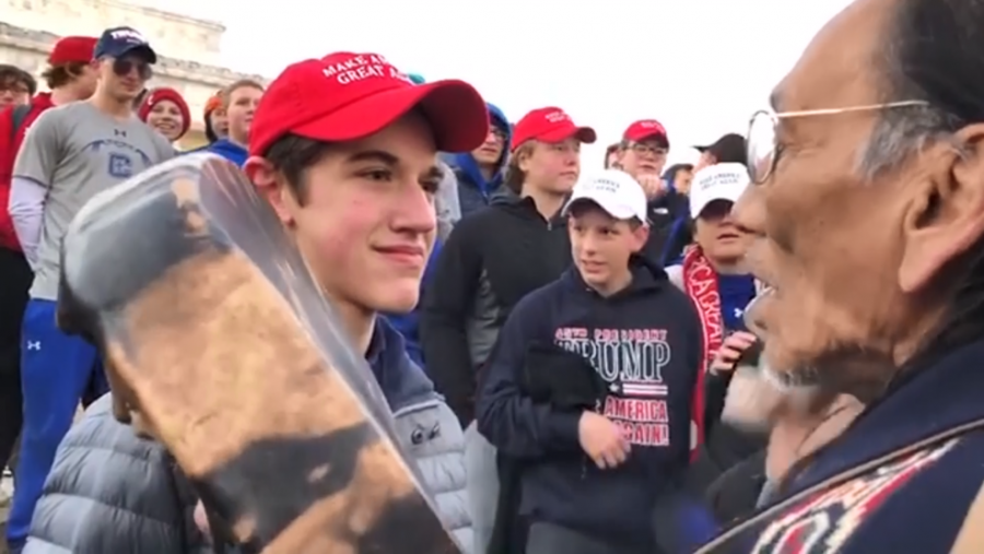 Covington+Catholic+High+School+student+Nick+Sandmanns+controversial+smirk%2C+which+caused+a+lot+of+outrage+online