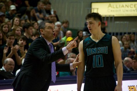 UNCW head coach C.B. McGrath directs the team during the Seahawks 93-88 win over William & Mary on Jan. 24, 2019.