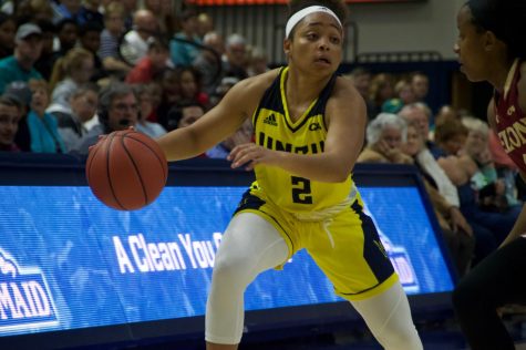 Moriah Crisp (2) dribbles against Elon on Feb 8 in Trask Coliseum.