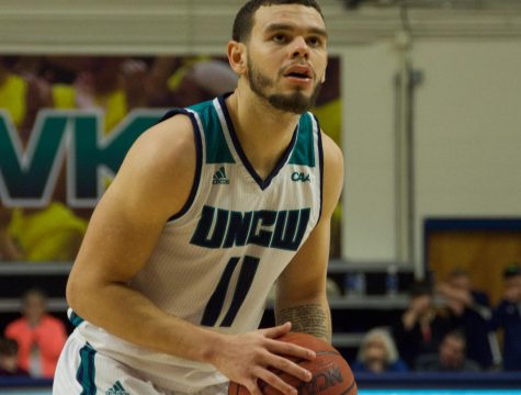 Jaylen Fornes (11) preps for a potential game-winning free throw with 12 seconds left during UNCW's matchup with Towson on Jan. 31, 2019.