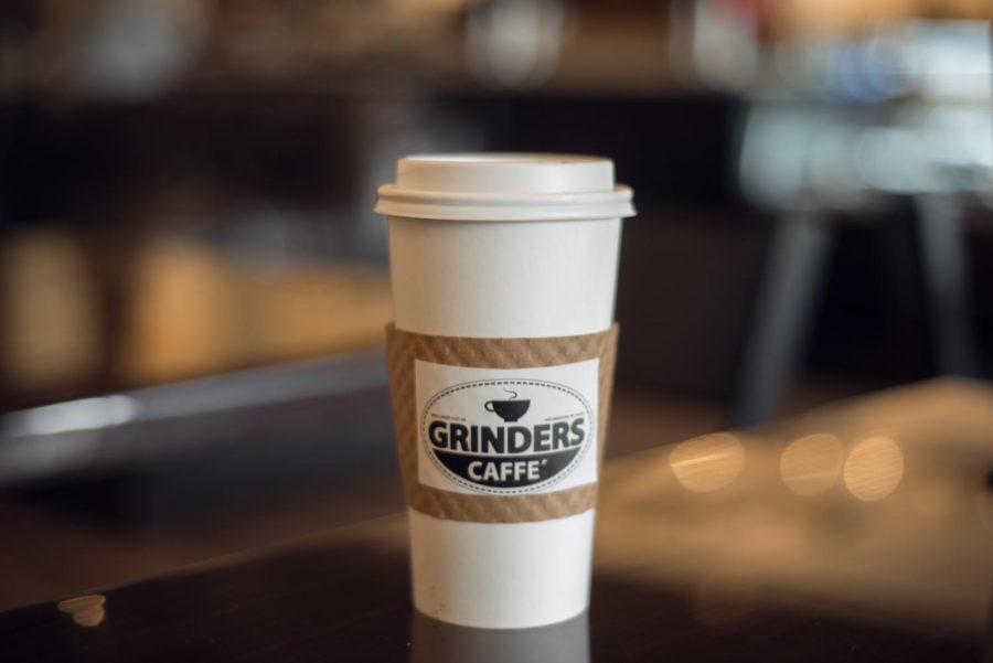 A large coffee from Grinders Caffe.