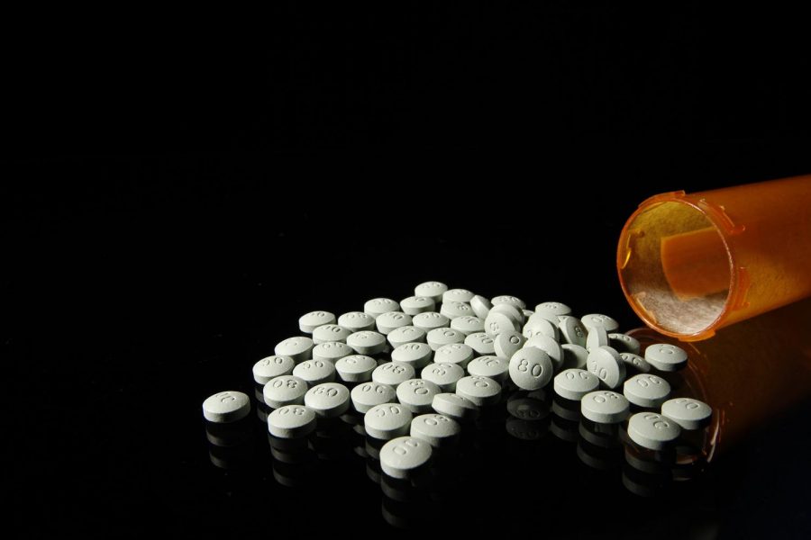 OxyContin 80 mg pills in an August 2013 file image. A new filing in a Massachusetts case ramps up the legal and financial pressure against the Sackler family, which owns the company that makes OxyContin. (Liz O. Baylen/Los Angeles Times/TNS)