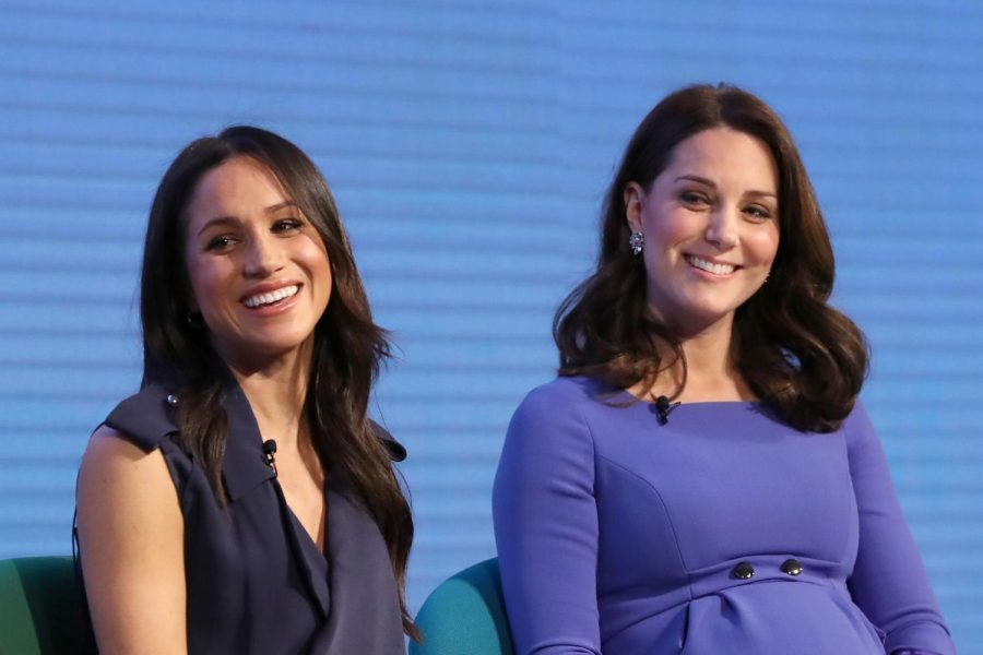 Meghan Markle, left, and Catherine, Duchess of Cambridge, attend the first Royal Foundation Forum on February 28, 2018, in London. (Rota/i-Images/Zuma Press/TNS)

