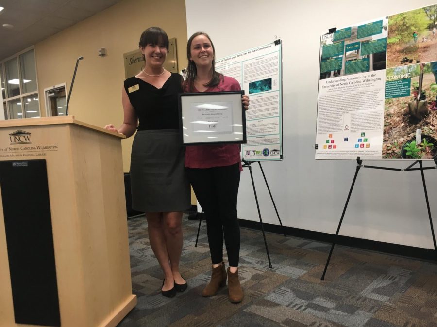 From left to right: Kathryn Pohlman, Environmental Health Safety Sustainability Captain, and Alexis Otts, psychology major who was awarded for her work on her sustainability project.