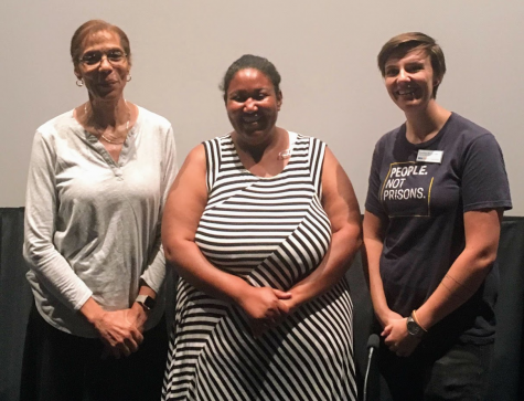 Caroline Morin-Gage (left), Ashley Powell (center), and Babette Boyd (right) pose for a photo after lecturing about the cash-bail system in the U.S.