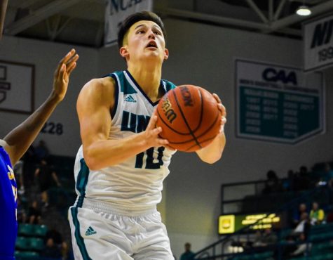 Kai Toews displaying some hang time on his way to the rim.