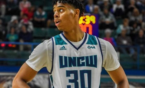 Jaylen Sims in UNCW's home opener against Johnson & Wales.