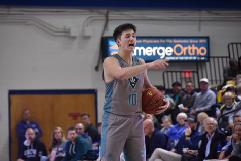 Kai Toews calls out to his team during UNCW's matchup with Campbell on Nov. 12, 2019 at Trask Coliseum.