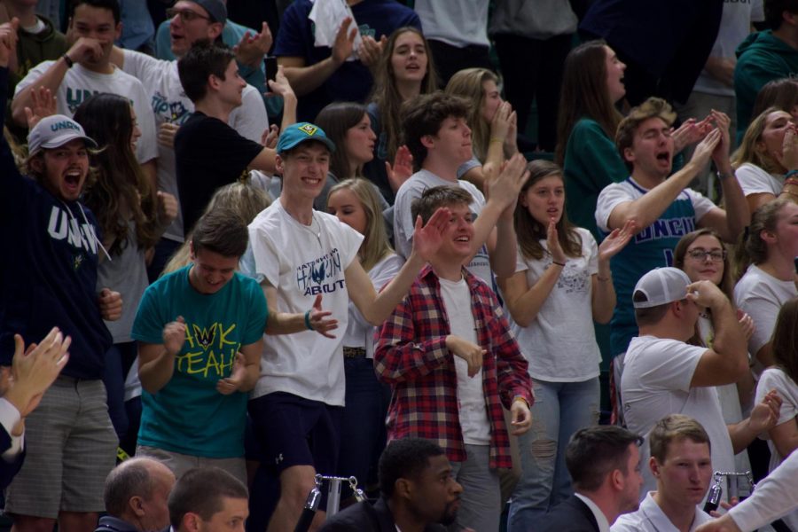 The UNCW student section celebrates